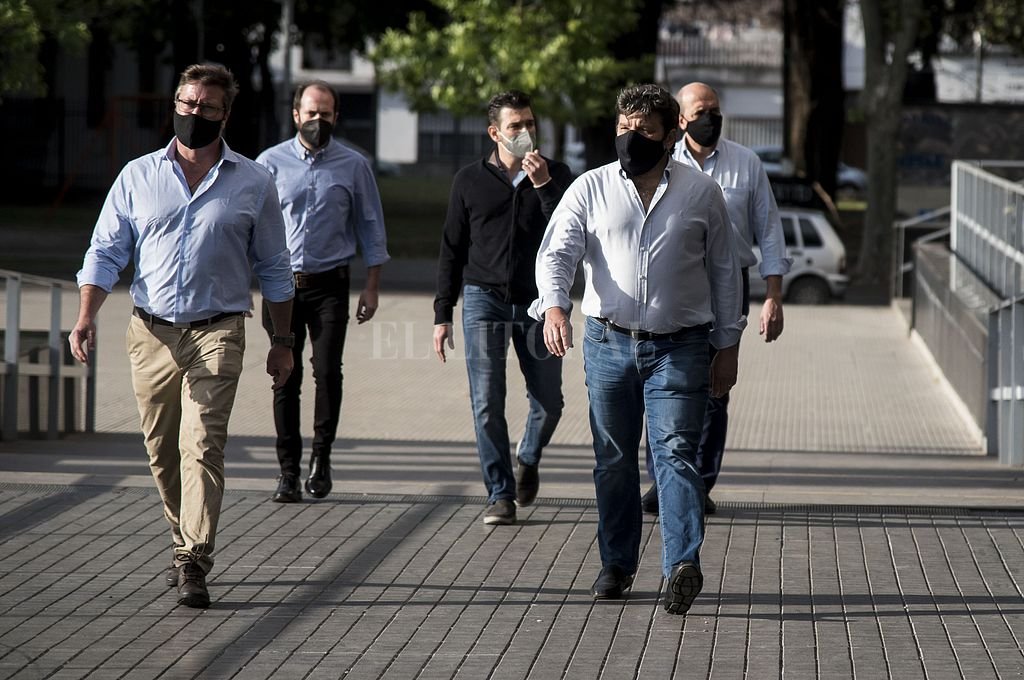Integrantes del directorio rumbo a una audiencia judicial. Marcelo Manera