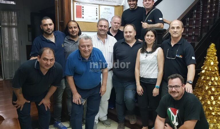 Guarco (de camisa blanca) es el segundo presidente latinoamericano de la ACI en sus 122 años de historia. Gentileza.