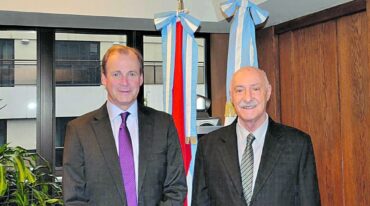El gobernador Gustavo Bordet y el titular del CFI