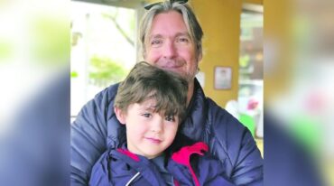 Julio junto a su hijo Luc